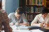 male_students_studying_in_librar_450.jpg