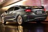 2014-Honda-Civic-Si-coupe-rear-motion-view-796x528.jpg